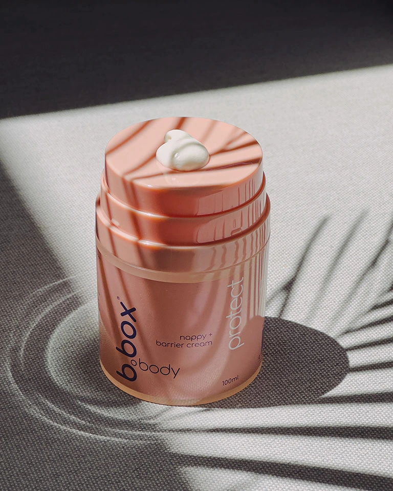 Stylised shot of the protect, nappy and barrier cream, dispenser
